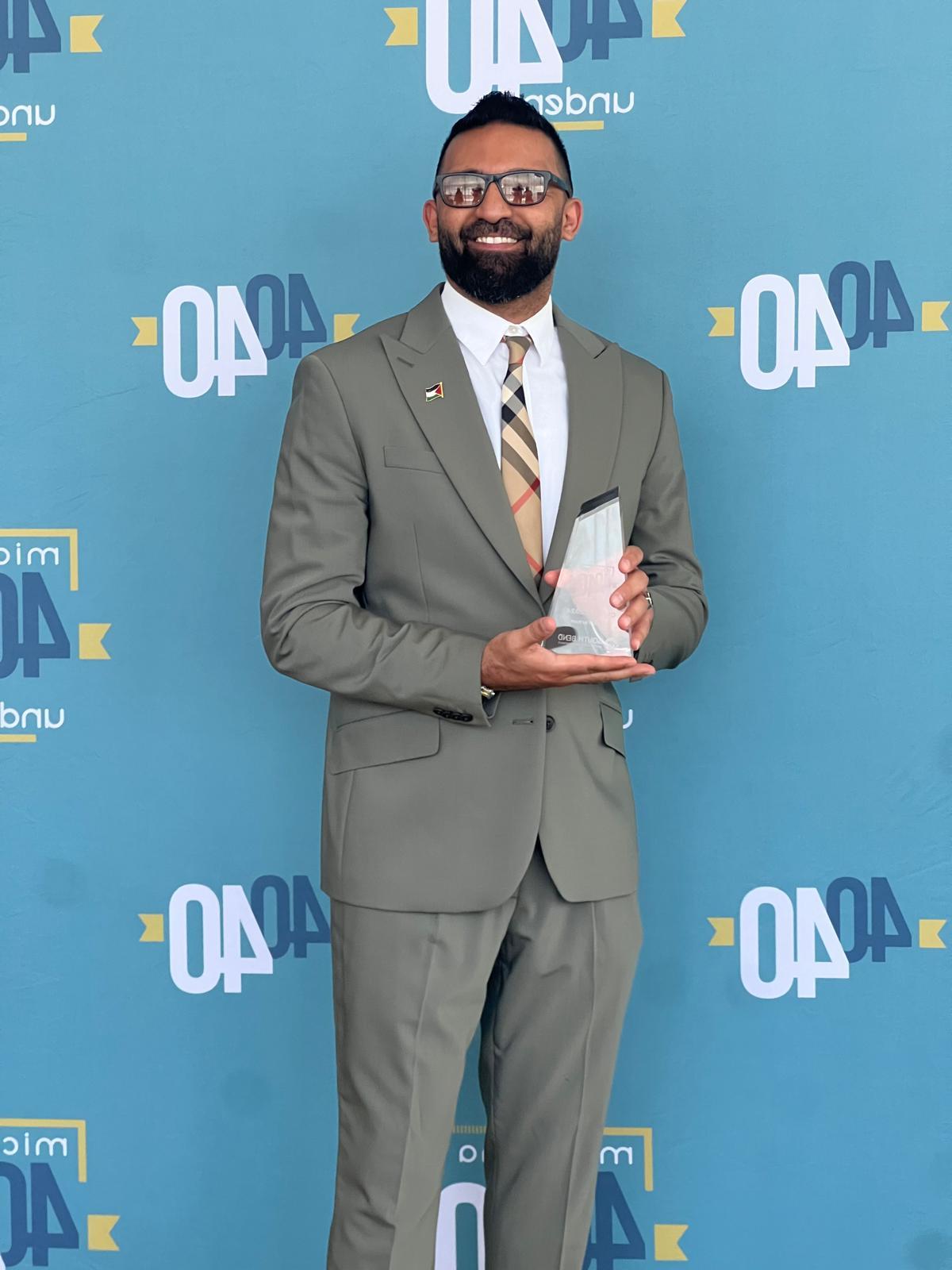 Fares Farhan, United Branch Manager, Accepts 40 Under 40 Award